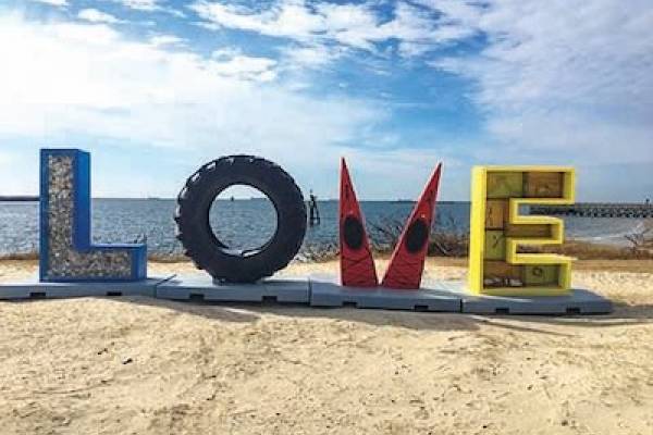 LOVE sign on beach in Cape Charles, VA